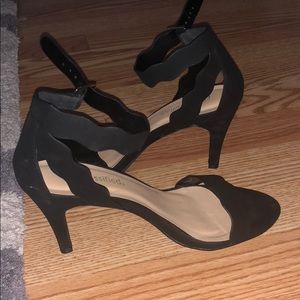 Black scalloped heels
